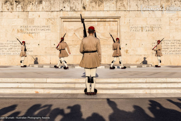 Excuse us while we change.Greek guards or Evzones are members of the Presidential Guard found outside the Hellenic Parliament in Athens. They guard the tomb of the Unknown soldier in pairs, emotionless and without movement except for the hourly changing of the guard ceremony. This draws large crowds of onlookers.
