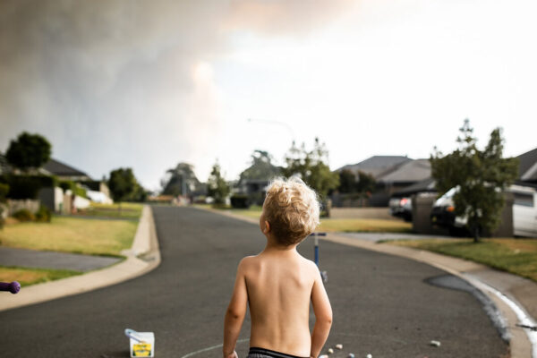 A Black Summer Childhood.The Summer of 2019-2020 was not a typical Aussie summer, with more than half of our Shoalhaven region burning for weeks on end.  On this day, our home became an emergency shelter for family and friends who were evacuated. We tried to keep our 3 year old son's world as normal as possible, but the chaos and change surrounding him often forced him to stop and look up. "Mum, why is the sky burning?"